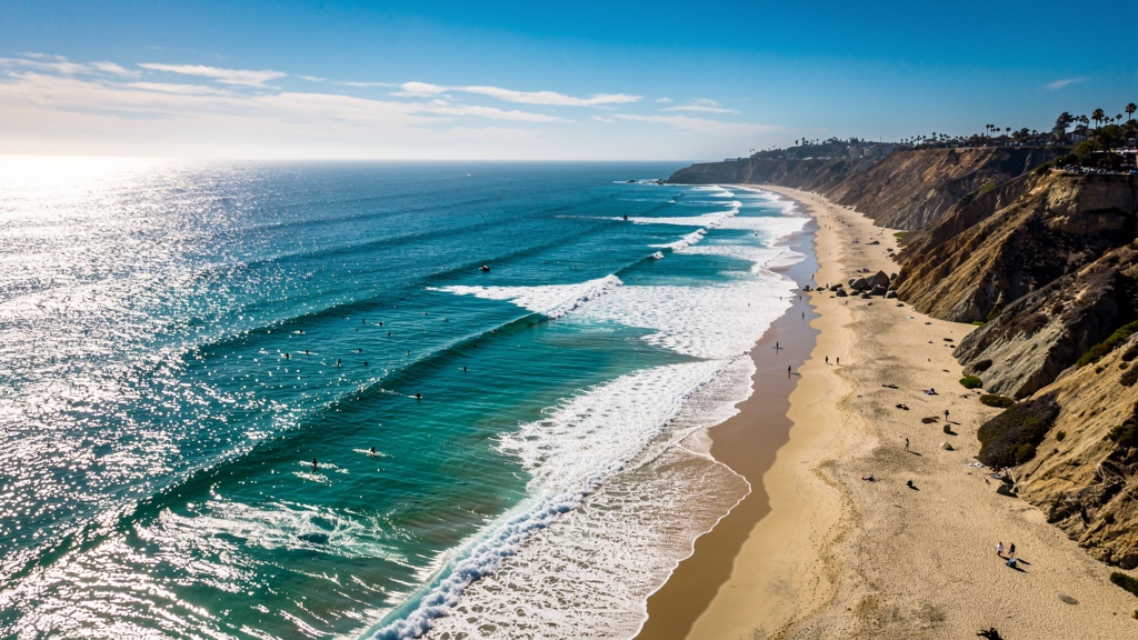 Malibu beach with crystal clear turquoise water and golden sand